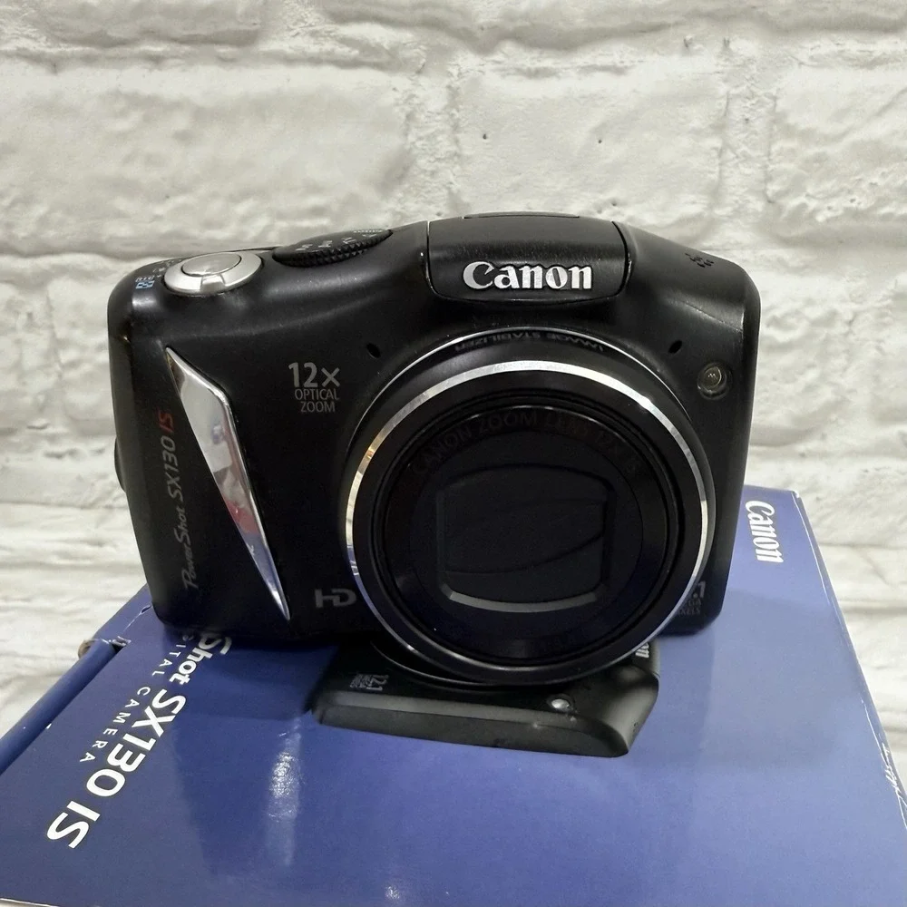 Canon SX130 IS Powershot Digital Camera 12x Optical Zoom 12.1 MP Black Excellent